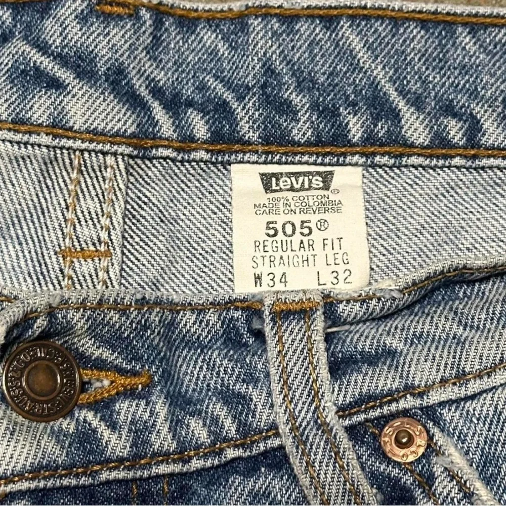 Levi’s 505 Vintage Orange tab Light Wash Jeans